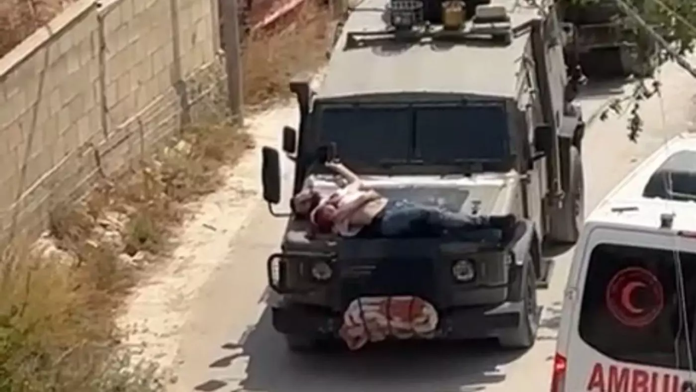 Filistinliyi Askeri Araca Bağlayıp Kalkan Olarak Kullandı.jpg