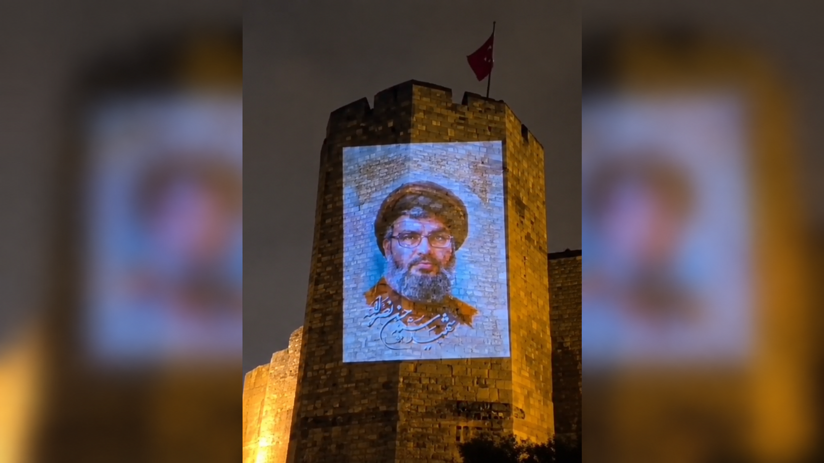 Edirnekapı'da yüz binlerce Suriyelinin katili Nasrallah'ın posteri yansıtıldı