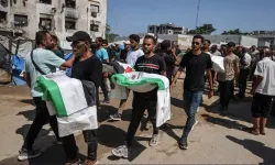 Terörist İsrail'in yıktığı 20 evin enkazından 233 şehit çıkarıldı